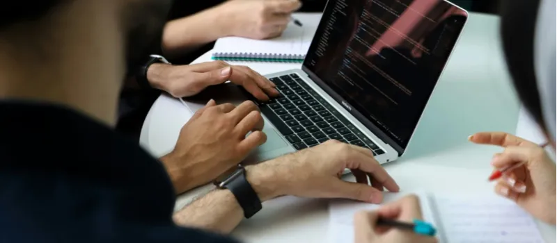 A group of business accountants working on tax report.