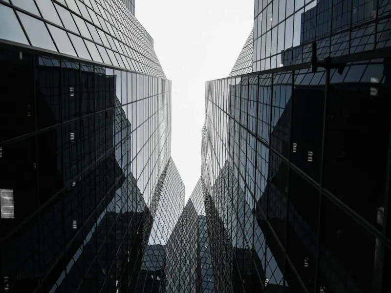 A commercial glass pane building where offices are located.